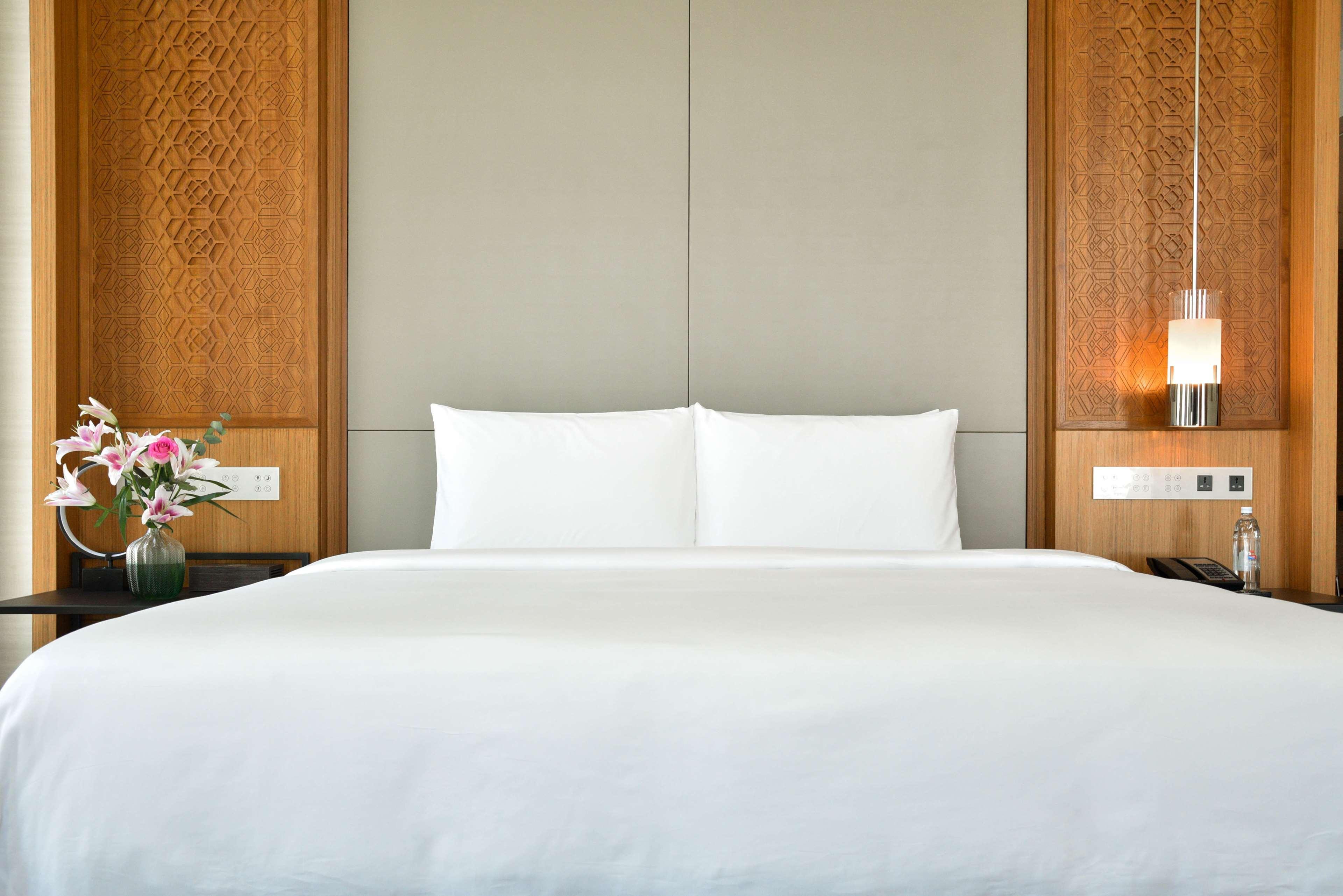 Park Hyatt Doha Hotel Kültér fotó A bed